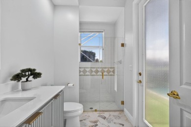 Set on a private cul-de-sac in the boutique Ironhorse community on Ironhorse Country Club in Florida - for sale on GolfHomes.com, golf home, golf lot
