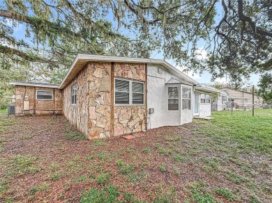 Discover this beautifully renovated 4-bedroom, 2-bathroom home on Temple Terrace Golf and Country Club in Florida - for sale on GolfHomes.com, golf home, golf lot