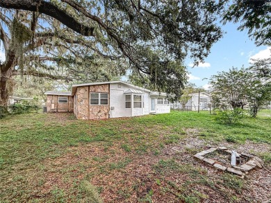 Discover this beautifully renovated 4-bedroom, 2-bathroom home on Temple Terrace Golf and Country Club in Florida - for sale on GolfHomes.com, golf home, golf lot