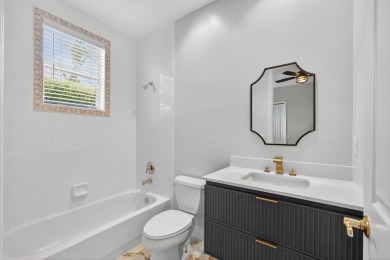 Set on a private cul-de-sac in the boutique Ironhorse community on Ironhorse Country Club in Florida - for sale on GolfHomes.com, golf home, golf lot