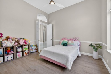 Set on a private cul-de-sac in the boutique Ironhorse community on Ironhorse Country Club in Florida - for sale on GolfHomes.com, golf home, golf lot