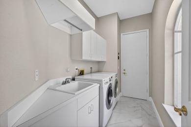 Set on a private cul-de-sac in the boutique Ironhorse community on Ironhorse Country Club in Florida - for sale on GolfHomes.com, golf home, golf lot