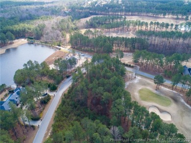 This wooded golf front home site is located in the gated on Anderson Creek Golf Club in North Carolina - for sale on GolfHomes.com, golf home, golf lot