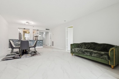 Come see this stunning, move-in-ready unit in Bonaire Village! on Marina Lakes Golf Course in Florida - for sale on GolfHomes.com, golf home, golf lot