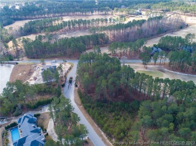 This wooded golf front home site is located in the gated on Anderson Creek Golf Club in North Carolina - for sale on GolfHomes.com, golf home, golf lot