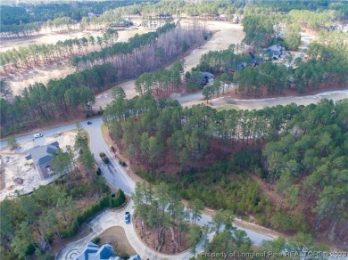 This wooded golf front home site is located in the gated on Anderson Creek Golf Club in North Carolina - for sale on GolfHomes.com, golf home, golf lot