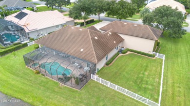 Located in the prestigious guard-gated Spruce Creek Fly-In on Spruce Creek Golf Club in Florida - for sale on GolfHomes.com, golf home, golf lot