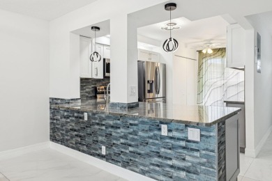 Come see this stunning, move-in-ready unit in Bonaire Village! on Marina Lakes Golf Course in Florida - for sale on GolfHomes.com, golf home, golf lot