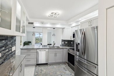 Come see this stunning, move-in-ready unit in Bonaire Village! on Marina Lakes Golf Course in Florida - for sale on GolfHomes.com, golf home, golf lot