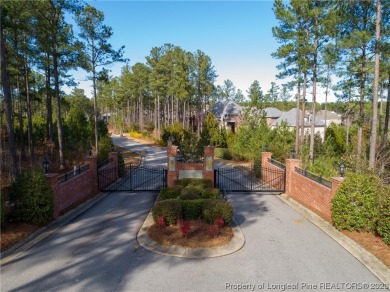 This wooded golf front home site is located in the gated on Anderson Creek Golf Club in North Carolina - for sale on GolfHomes.com, golf home, golf lot