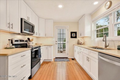 Nostalgic beach cottage on 40th St with  amazing sunsets and on Oyster Bay Golf Links in North Carolina - for sale on GolfHomes.com, golf home, golf lot