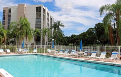 BEAUTIFUL CORNER UNIT WITH EAST EXPOSURE, LAKE, GOLF COURSE, AND on  in Florida - for sale on GolfHomes.com, golf home, golf lot