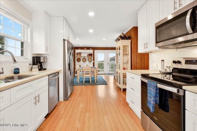 Nostalgic beach cottage on 40th St with  amazing sunsets and on Oyster Bay Golf Links in North Carolina - for sale on GolfHomes.com, golf home, golf lot