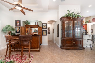 Located in the prestigious guard-gated Spruce Creek Fly-In on Spruce Creek Golf Club in Florida - for sale on GolfHomes.com, golf home, golf lot