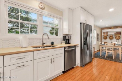 Nostalgic beach cottage on 40th St with  amazing sunsets and on Oyster Bay Golf Links in North Carolina - for sale on GolfHomes.com, golf home, golf lot