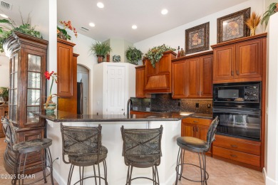 Located in the prestigious guard-gated Spruce Creek Fly-In on Spruce Creek Golf Club in Florida - for sale on GolfHomes.com, golf home, golf lot