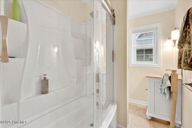 Nostalgic beach cottage on 40th St with  amazing sunsets and on Oyster Bay Golf Links in North Carolina - for sale on GolfHomes.com, golf home, golf lot