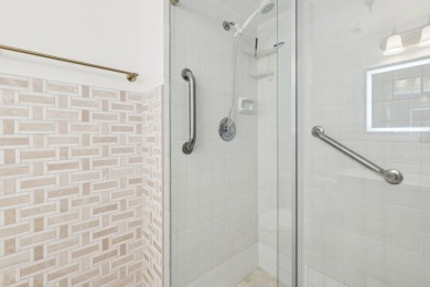 Come see this stunning, move-in-ready unit in Bonaire Village! on Marina Lakes Golf Course in Florida - for sale on GolfHomes.com, golf home, golf lot