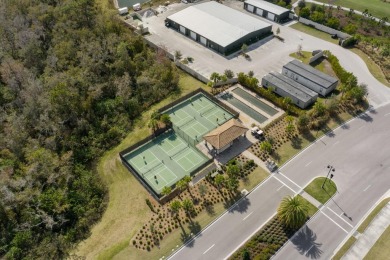 LOCATION, LOCATION, LOCATION! This exceptional home is just on Lakewood National Golf Club in Florida - for sale on GolfHomes.com, golf home, golf lot