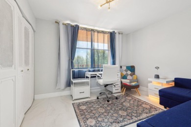 Come see this stunning, move-in-ready unit in Bonaire Village! on Marina Lakes Golf Course in Florida - for sale on GolfHomes.com, golf home, golf lot