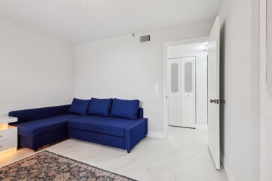 Come see this stunning, move-in-ready unit in Bonaire Village! on Marina Lakes Golf Course in Florida - for sale on GolfHomes.com, golf home, golf lot