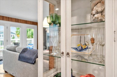 Nostalgic beach cottage on 40th St with  amazing sunsets and on Oyster Bay Golf Links in North Carolina - for sale on GolfHomes.com, golf home, golf lot