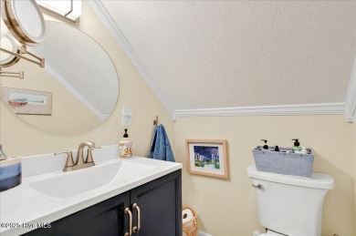 Nostalgic beach cottage on 40th St with  amazing sunsets and on Oyster Bay Golf Links in North Carolina - for sale on GolfHomes.com, golf home, golf lot