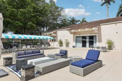 Come see this stunning, move-in-ready unit in Bonaire Village! on Marina Lakes Golf Course in Florida - for sale on GolfHomes.com, golf home, golf lot