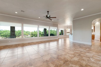 This stunning home in Horseshoe Bay West is perched on two on Ram Rock Golf Course in Texas - for sale on GolfHomes.com, golf home, golf lot