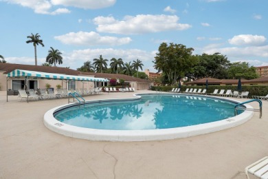 Come see this stunning, move-in-ready unit in Bonaire Village! on Marina Lakes Golf Course in Florida - for sale on GolfHomes.com, golf home, golf lot