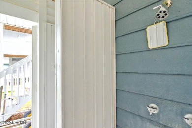 Nostalgic beach cottage on 40th St with  amazing sunsets and on Oyster Bay Golf Links in North Carolina - for sale on GolfHomes.com, golf home, golf lot