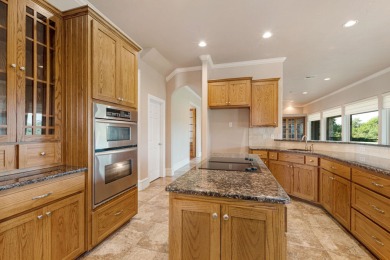 This stunning home in Horseshoe Bay West is perched on two on Ram Rock Golf Course in Texas - for sale on GolfHomes.com, golf home, golf lot