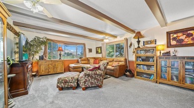 This Jewel of a home is ready to be yours! Artfully painted and on Lincoln Park Golf Course in Colorado - for sale on GolfHomes.com, golf home, golf lot