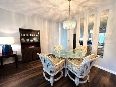 Nestled within the serene enclave of the On Top of the World on On Top Of The World Golf Course in Florida - for sale on GolfHomes.com, golf home, golf lot