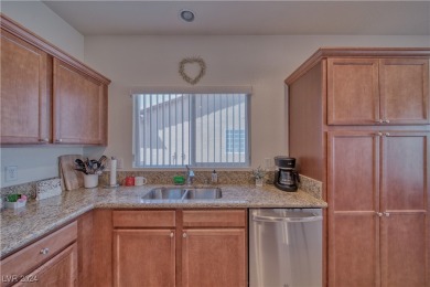 This beautiful single-story home features 2 bedrooms and a on Mountain Falls Golf Course in Nevada - for sale on GolfHomes.com, golf home, golf lot