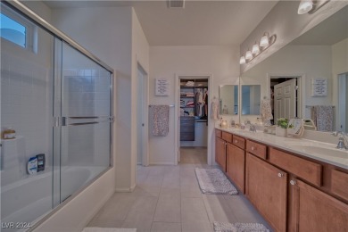 This beautiful single-story home features 2 bedrooms and a on Mountain Falls Golf Course in Nevada - for sale on GolfHomes.com, golf home, golf lot