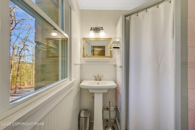 This charming three-bedroom, two-and-a-half-bathroom cottage on Buck Hill Golf Club  in Pennsylvania - for sale on GolfHomes.com, golf home, golf lot