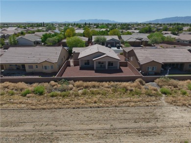 This beautiful single-story home features 2 bedrooms and a on Mountain Falls Golf Course in Nevada - for sale on GolfHomes.com, golf home, golf lot