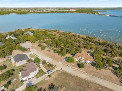 Discover the beauty of Joe Pool Lake with this one-of-a-kind on Tangle Ridge Golf Club in Texas - for sale on GolfHomes.com, golf home, golf lot