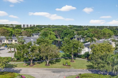 Welcome to 6815 Willow Wood Drive #4083, where refined living on Boca West Golf and Country Club in Florida - for sale on GolfHomes.com, golf home, golf lot