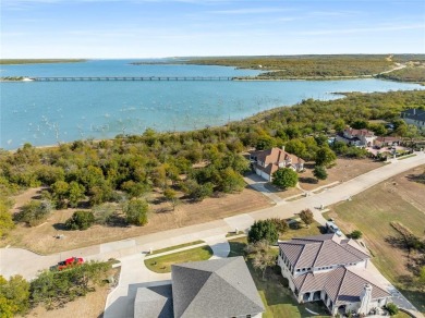 Discover the beauty of Joe Pool Lake with this one-of-a-kind on Tangle Ridge Golf Club in Texas - for sale on GolfHomes.com, golf home, golf lot