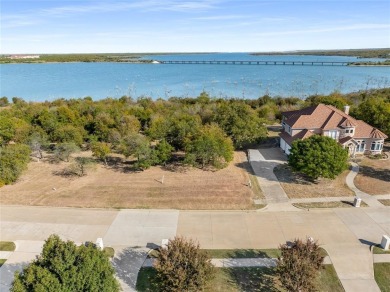 Discover the beauty of Joe Pool Lake with this one-of-a-kind on Tangle Ridge Golf Club in Texas - for sale on GolfHomes.com, golf home, golf lot