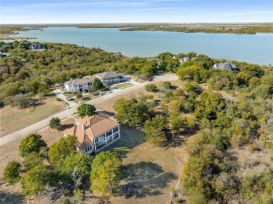 Discover the beauty of Joe Pool Lake with this one-of-a-kind on Tangle Ridge Golf Club in Texas - for sale on GolfHomes.com, golf home, golf lot