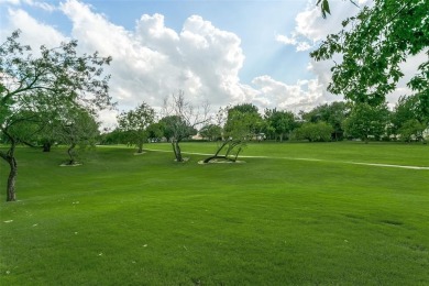 Situated on the picturesque 7th fairway of the exclusive gated on Hackberry Creek Country Club in Texas - for sale on GolfHomes.com, golf home, golf lot