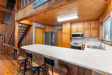 Stunning waterfront property located on Lake Cypress Springs in on Cypress Creek Country Club in Texas - for sale on GolfHomes.com, golf home, golf lot