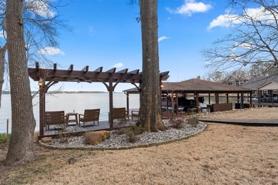 Stunning waterfront property located on Lake Cypress Springs in on Cypress Creek Country Club in Texas - for sale on GolfHomes.com, golf home, golf lot