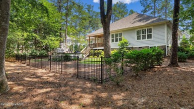 Located minutes from the charming Village of Pinehurst, this on Pinewild Country Club of Pinehurst in North Carolina - for sale on GolfHomes.com, golf home, golf lot