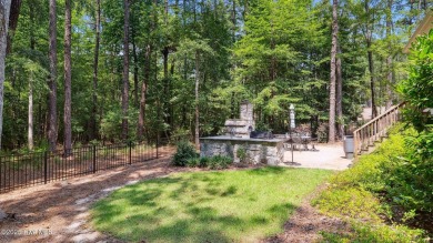 Located minutes from the charming Village of Pinehurst, this on Pinewild Country Club of Pinehurst in North Carolina - for sale on GolfHomes.com, golf home, golf lot