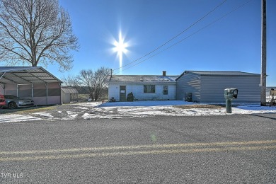 Great investment property/fixer upper with plenty of outdoor on The Crossings Golf Club in Tennessee - for sale on GolfHomes.com, golf home, golf lot