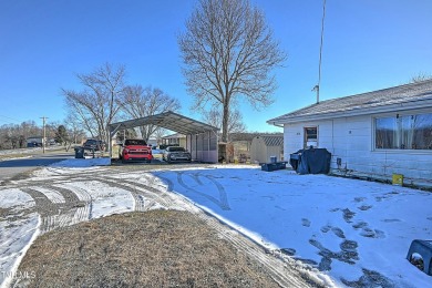 Great investment property/fixer upper with plenty of outdoor on The Crossings Golf Club in Tennessee - for sale on GolfHomes.com, golf home, golf lot